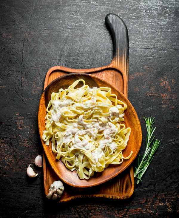 What's the Secret to a Rich and Creamy Carbonara with Homemade Guanciale?